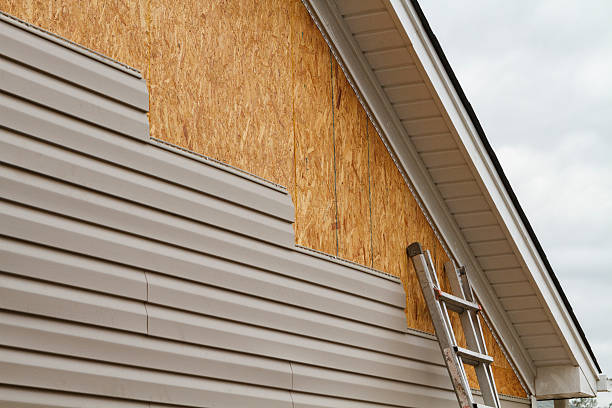 Professional Emergency Siding Repair technician working in Lakewood, NY